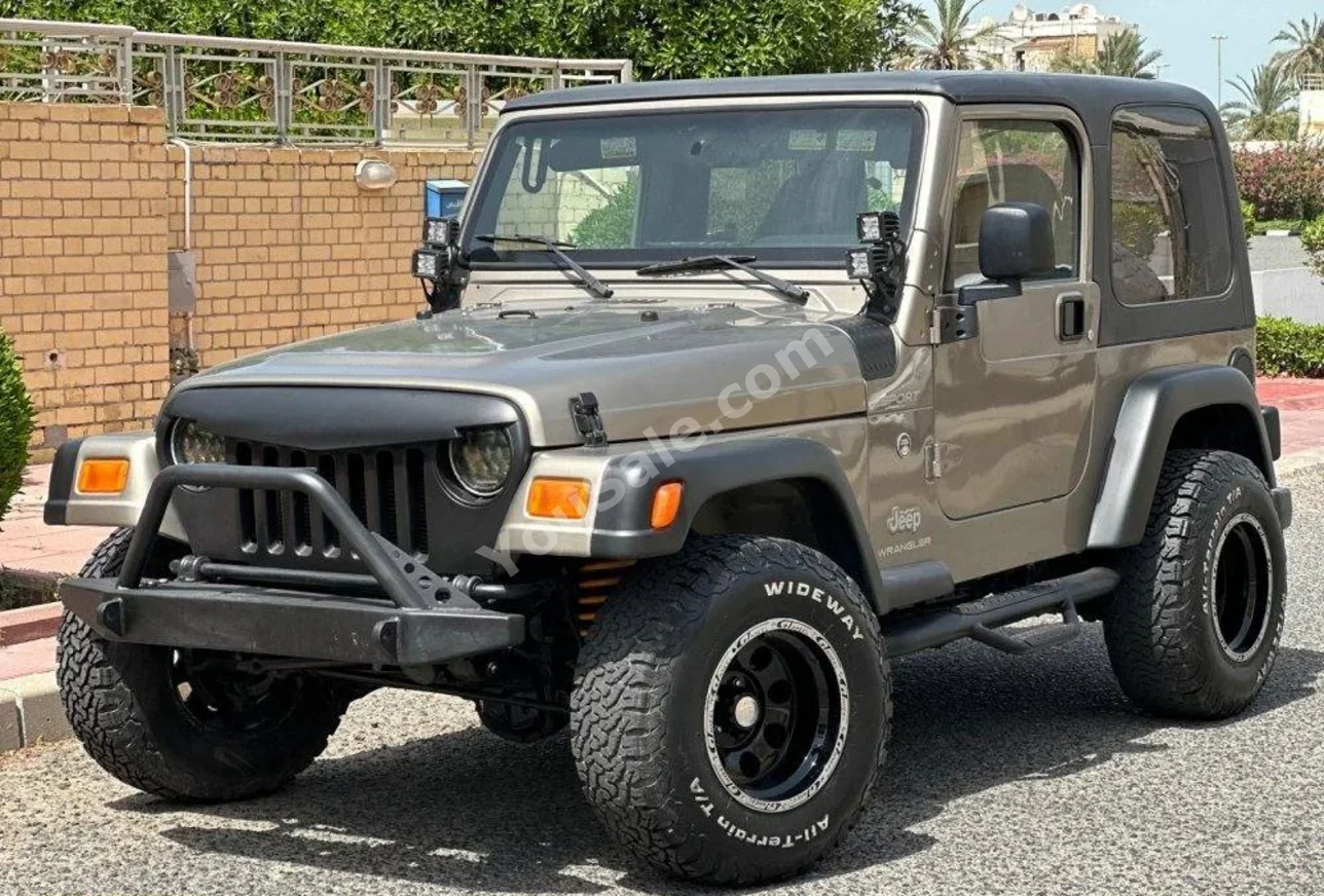 Jeep  Wrangler  Sport  2006  Automatic  154,000 Km  4 Cylinder  4WD  Coupe / Sport  Gold