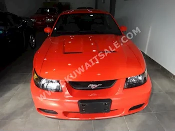 Ford  Mustang  2004  80,000  Coupe / Sport  Automatic  8  Leather  RWD  Orange  Gasoline