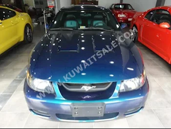 Ford  Mustang  2004  40,000  Coupe / Sport  Manual  8  Leather  RWD  Purple  Gasoline