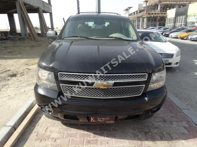 Chevrolet  Tahoe  2009  200,000  SUV  Automatic  8  Cloth  RWD  Black  Gasoline
