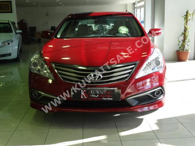 هيونداي  ازيرا  2015  20,000  سيدان  اتوماتك  6  مخمل  دفع أمامي  عنابي  بنزين