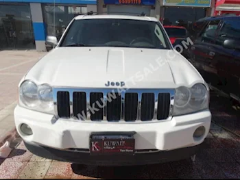 Jeep  Grand Cherokee  2005  190,000  SUV  Automatic  8  Leather  4WD  White  Gasoline