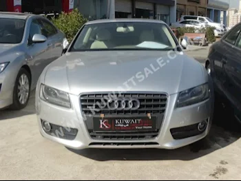 اودي  2.0 T  أي 5  2010  33,000  كوبيه \ سبورت  اتوماتك  4  جلد  دفع رباعي  فضي  بنزين