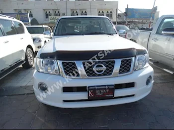 نيسان  سفاري  باترول  2009  130,000  اس يو في  اتوماتك  8  مخمل  دفع رباعي  أبيض  بنزين