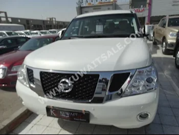 Nissan  Patrol  2012  125,000  SUV  Manual  8  Cloth  4WD  White  Gasoline