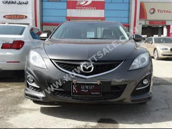Mazda  Mazda 6  2012  69,000  Sedan  Automatic  4  Cloth  FWD  Brown  Gasoline