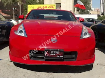 نيسان  370  زد  2009  95,000  كوبيه \ سبورت  عادي  6  جلد  دفع خلفي  أحمر  بنزين