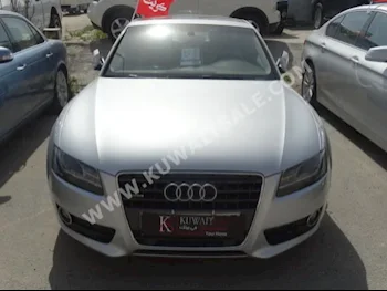 Audi  A5  2012  30,000  Coupe / Sport  Automatic  4  Leather  RWD  Silver  Gasoline