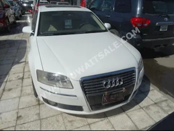 Audi  L  A8  2007  184,000  Sedan  Automatic  8  Leather  RWD  White  Gasoline