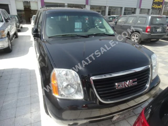 GMC  Yukon  2007  165,000  SUV  Automatic  8  Cloth  RWD  Black  Gasoline