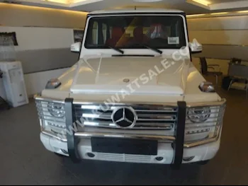 مرسيدس - بنز  500  جي - كلاس  2015  0  اس يو في  اتوماتك  8  جلد  دفع رباعي  أبيض  بنزين