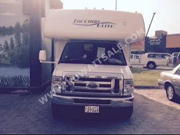 Ford  Van  2012  69,000  Van / Bus  Automatic  10  Leather / Cloth  4WD  White  Gasoline