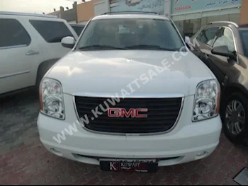 GMC  Yukon  2011  115,000  SUV  Automatic  8  Cloth  4WD  White  Gasoline