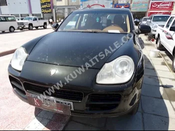 Porsche  S  Cayenne  2006  300,000  SUV  Automatic  6  Leather  4WD  Dark Green  Gasoline