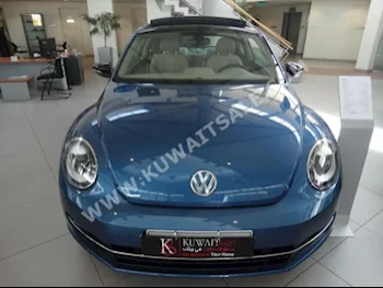 Volkswagen  SE  Beetle  2016  0  Coupe / Sport  Automatic  4  Cloth  FWD  Blue  Gasoline