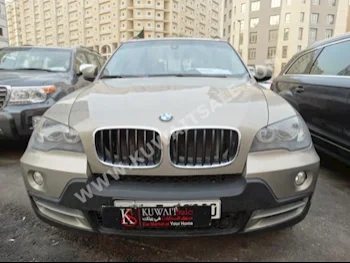 بي ام دبليو  5  الفئة - اكس  2010  69,000  اس يو في  اتوماتك  8  جلد  دفع رباعي  ذهبي  بنزين