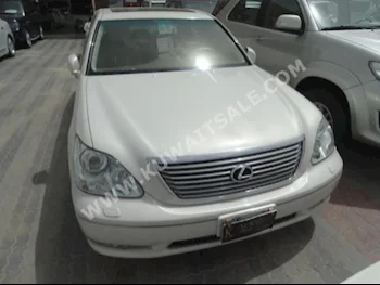 Lexus  430  LS  2005  158,000  Sedan  Automatic  8  Leather  RWD  Off White  Gasoline