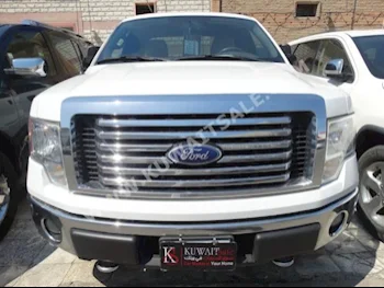 Ford  150  F  2010  148,000  Pick Up  Automatic  8  Cloth  4WD  White  Gasoline