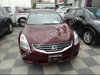 نيسان  2.5  ألتيما  2011  159,000  سيدان  اتوماتك  4  مخمل  دفع أمامي  عنابي  بنزين
