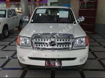زي إكس أوتو  جراند تايغر  2015  0  بيكب  عادي  4  مخمل  دفع أمامي  أبيض  بنزين