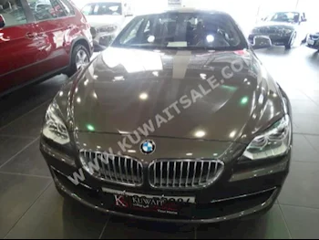 بي ام دبليو  650i  الفئة - السادسة  2013  84,250  كوبيه \ سبورت  اتوماتك  8  جلد  دفع خلفي  بني  بنزين