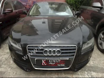 اودي  أي 5  2011  45,000  سيدان  اتوماتك  6  جلد  دفع خلفي  أسود  بنزين