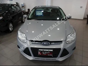 Ford  Focus  2014  21,000  Sedan  Automatic  4  Cloth  FWD  Silver  Gasoline