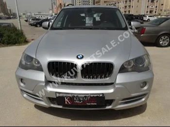 BMW  5  X-Series  2009  125,000  SUV  Automatic  6  Leather  4WD  Silver  Gasoline