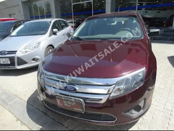 Ford  Fusion  2014  77,000  Sedan  Automatic  4  Cloth  FWD  Dark Red  Gasoline