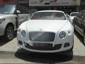 Bentley  GT Speed  2012  70,000  Coupe / Sport  Automatic  12  Leather  RWD  White  Gasoline
