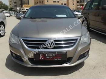 Volkswagen  Passat  2011  90,000  Sedan  Automatic  4  Leather  FWD  Brown  Gasoline