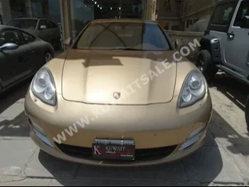 بورش  4S  بانميرا  2011  77,000  سيدان  اتوماتك  6  جلد  دفع أمامي  ذهبي  بنزين