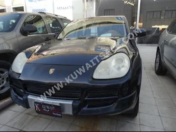 بورش  اس  كيان  2004  200,000  اس يو في  اتوماتك  8  جلد  دفع رباعي  أسود  بنزين