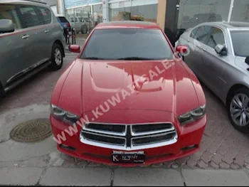 دودج  ار تي  تشارجر  2013  130,000  سيدان  اتوماتك  8  جلد  دفع خلفي  أحمر  بنزين