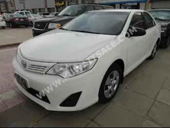 Toyota  GL  Camry  2014  70,000  Sedan  Automatic  4  Cloth  FWD  White  Gasoline