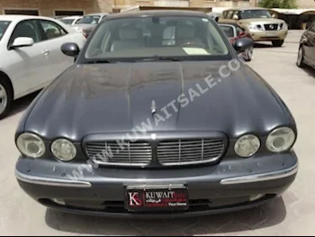 Jaguar  8  XJ  2005  146,000  Sedan  Automatic  6  Leather  RWD  Gray  Gasoline