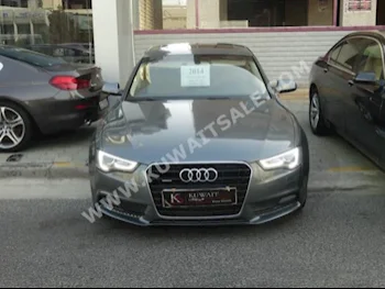 Audi  2.0 T  A5  2014  64,000  Sedan  Automatic  4  Leather  4WD  Gray  Gasoline