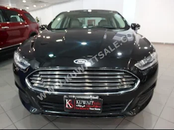 فورد  فيوشن  2014  41,000  سيدان  اتوماتك  4  مخمل  دفع أمامي  أسود  بنزين