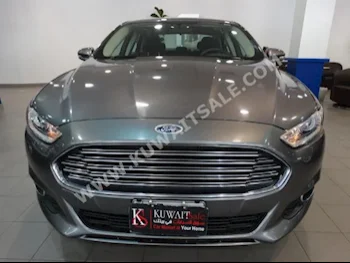 فورد  فيوشن  2014  7,000  سيدان  اتوماتك  4  مخمل  دفع أمامي  رمادي  بنزين