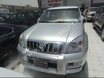 Toyota  TXL  Prado  2003  250,000  SUV  Automatic  6  Cloth  4WD  Silver  Gasoline