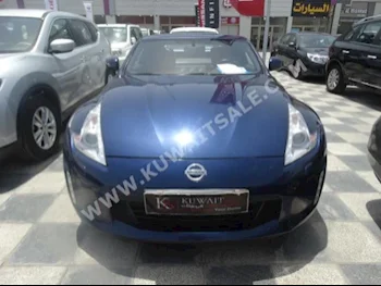 نيسان  370  زد  2014  29,000  كوبيه \ سبورت  اتوماتك  6  جلد  دفع خلفي  أزرق غامق  بنزين