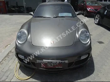 Porsche  Carrera  911  2007  107,000  Coupe / Sport  Automatic  8  Leather  RWD  Silver  Gasoline