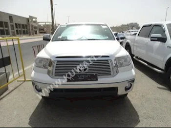 Toyota  Platinum  Tundra  2012  79,000  Pick Up  Automatic  8  Leather  4WD  White  Gasoline