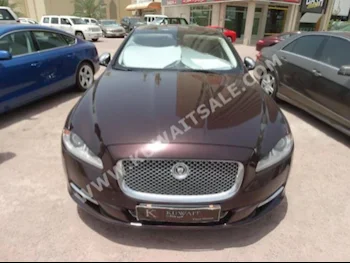 Jaguar  L  XJ  2011  71,000  Sedan  Automatic  6  Leather  RWD  Maroon  Gasoline