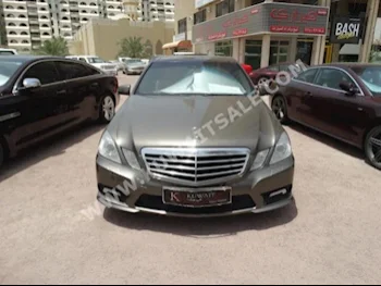 Mercedes-Benz  300  E-Class  2012  100,000  Sedan  Automatic  6  Leather  RWD  Bronze  Gasoline