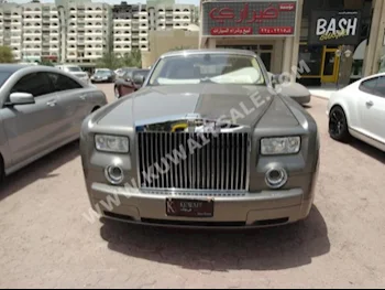 Rolls-Royce  Phantom  2006  16,000  Sedan  Automatic  12  Leather  RWD  Gold  Gasoline