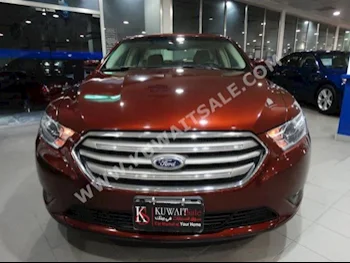 Ford  SEL  Taurus  2015  32,000  Sedan  Automatic  6  Cloth  FWD  Brown  Gasoline