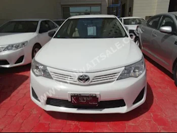 Toyota  GL  Camry  2014  30,000  Sedan  Automatic  4  Cloth  FWD  White  Gasoline