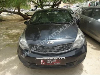 Kia  Rio  2014  40,000  Sedan  Automatic  4  Cloth  FWD  Gray  Gasoline