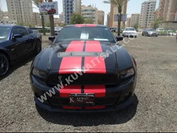 فورد  شيلبي جي تي500  موستانغ  2012  25,000  كوبيه \ سبورت  عادي  8  جلد  دفع خلفي  أسود  بنزين